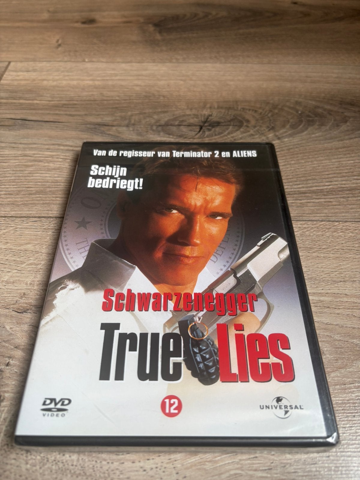 True Lies *Nieuw in plastic* met Arnold Schwarzenegger, Vanaf 16 jaar, Ophalen of Verzenden, Zo goed als nieuw