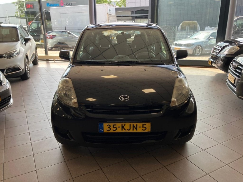 Daihatsu Sirion 2 1.0-12V Premium AIRCO APK 11-27 BJ 2010 !, Auto's, Daihatsu, Gebruikt, Zwart, Bedrijf, Handgeschakeld