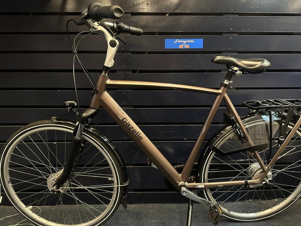Gazelle orange C7 plus 61cm of 57cm show model met garantie, Ophalen, Zo goed als nieuw, Gazelle