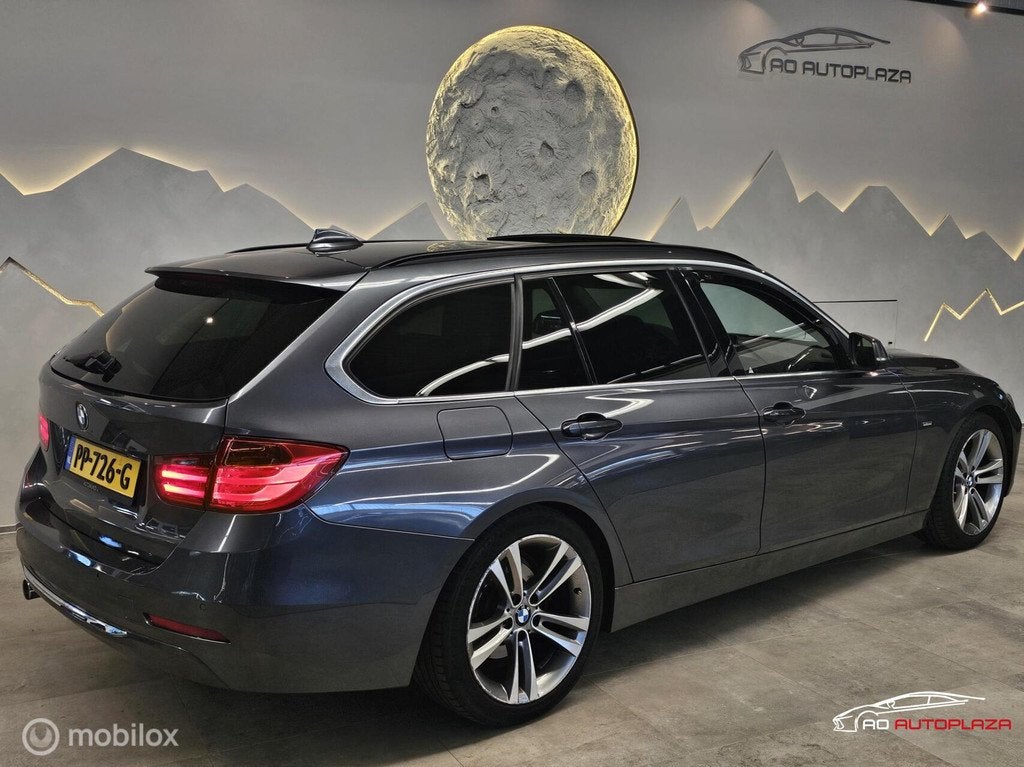 BMW 3-serie Touring 320d Panorama/Harman Kardon/Keyless, Auto's, Automaat, Achterwielaandrijving, 1995 cc, Zwart