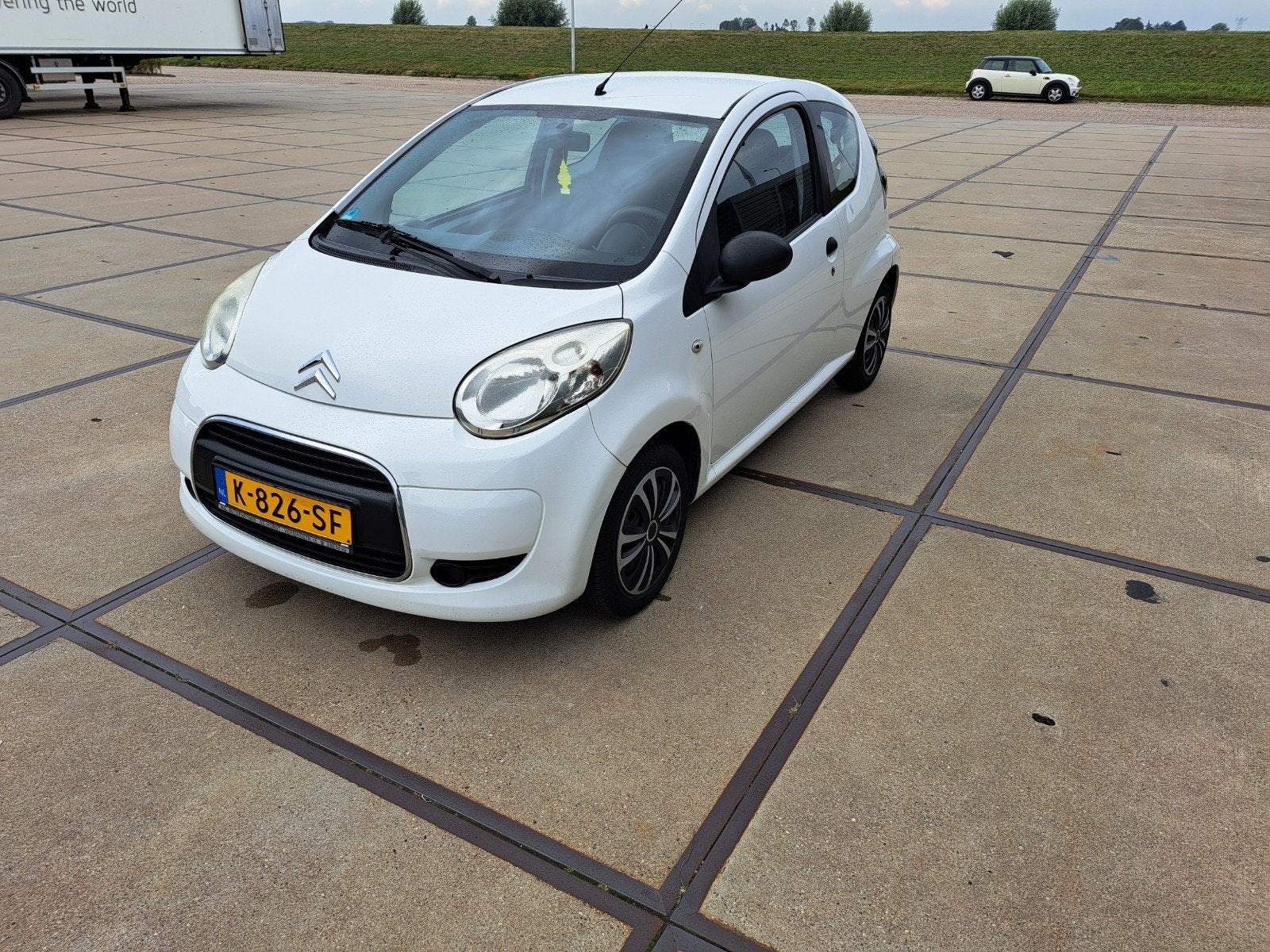 Citroën C1 1.0 3-DRS 2011 Wit, Auto's, Voorwielaandrijving, Stof, Zwart, 4 stoelen