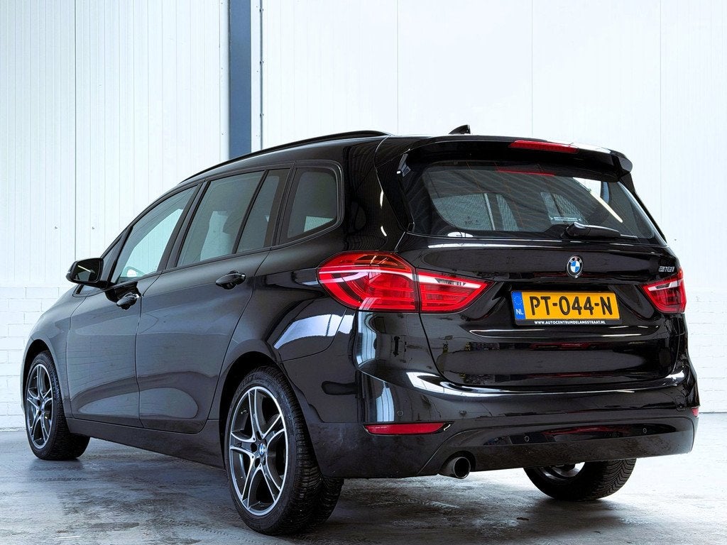 BMW 2-serie Gran Tourer 218i Centennial High Executive, Auto's, BMW, Gebruikt, Euro 6, 2-Serie Gran Tourer, Zwart