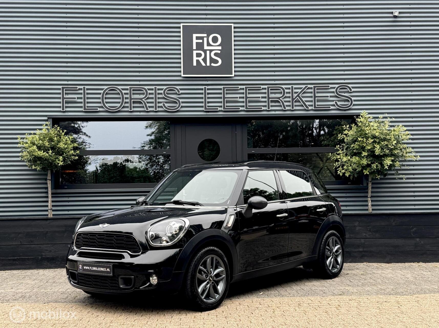 Mini Countryman 2.0 SD ALL4 | Pano dak | Xenon | Zwart Leer, Auto's, Automaat, Euro 5, Zwart, Leder