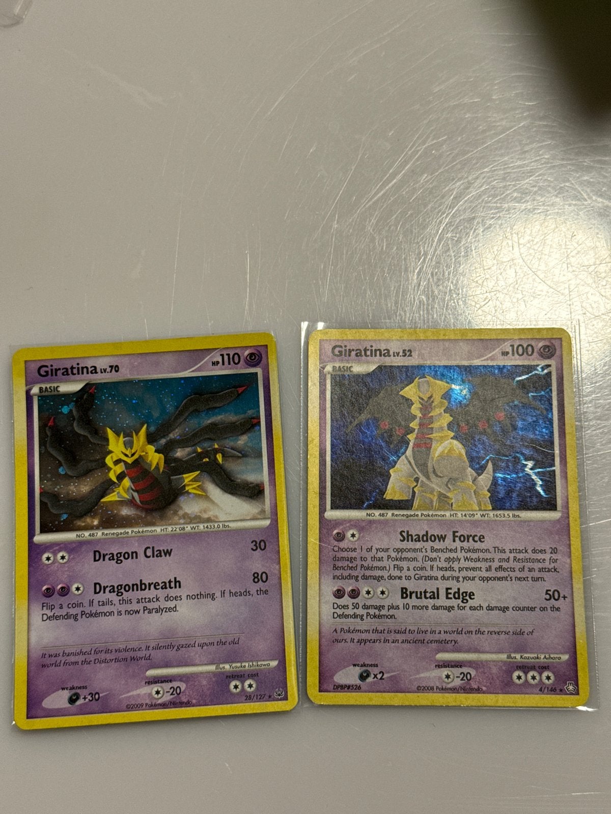 Giratina Pokémon kaarten (2 stuks), Ophalen of Verzenden, Zo goed als nieuw, Meerdere kaarten