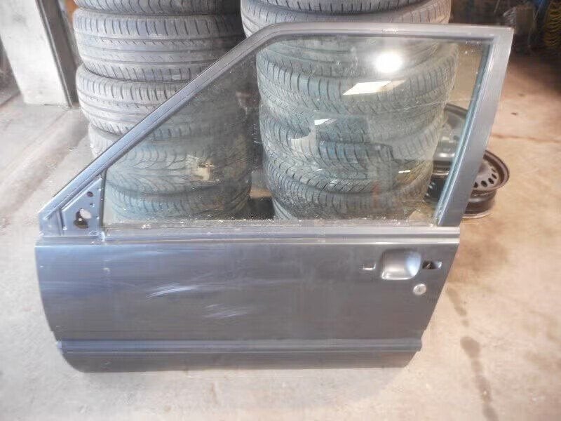 PORTIER LINKS VOOR Volvo 940 I Estate (01-1990/10-1998), Gebruikt, Deur, Info@volvocars.com, Ophalen of Verzenden
