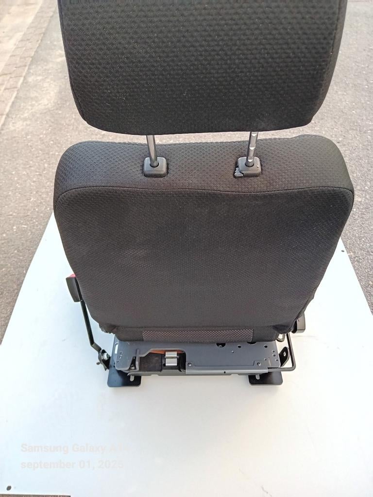 Speciale draaistoel voor de. Bijrijder, Ophalen