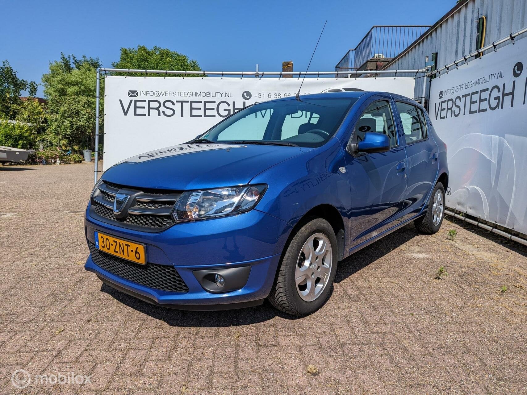 Dacia Sandero 0.9 TCe Lauréate, Navigatie, Airco, Cruise, Auto's, Voorwielaandrijving, Gebruikt, 937 kg, Met garantie (alle)