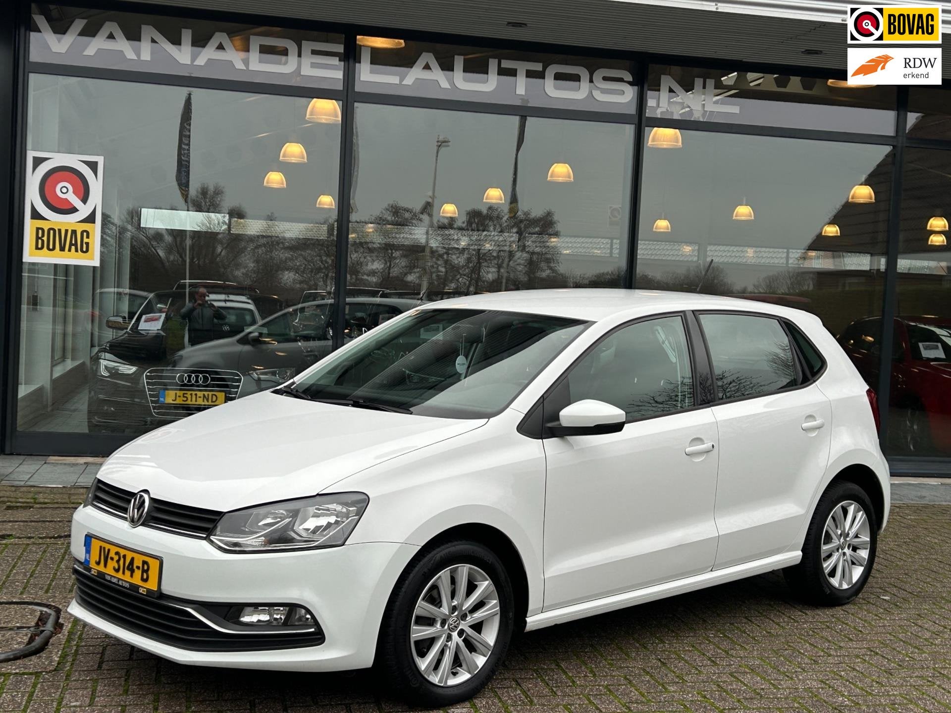 Volkswagen Polo 1.2 TSI 90PK Comfortline 5Drs Airco Cruise L, Auto's, Dealer onderhouden, Stof, 4 cilinders, Wit