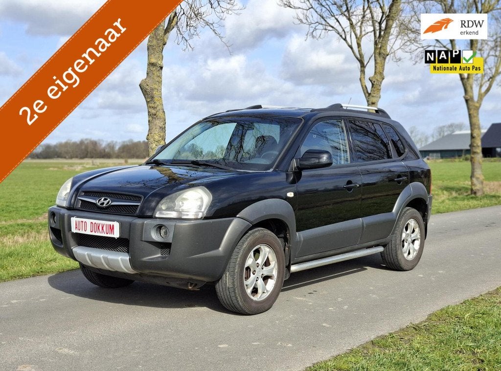 Hyundai Tucson 2.0i Style Cross, 2e eigenaar, Auto's, Hyundai, Stof, Gebruikt, Parkeersensor, 4 cilinders