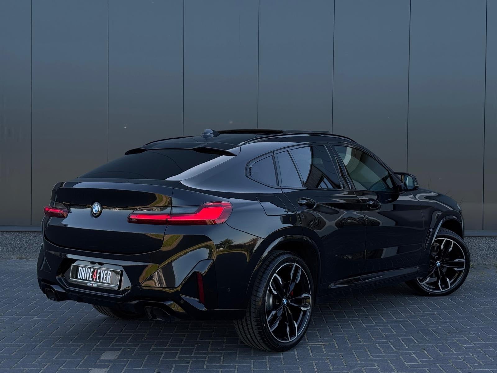 BMW X4 M40i FULL CARBON | PANO | KUIPSTOELEN | 360 CAMERA |, Auto's, BMW, Automaat, Dealer onderhouden, Zwart, Bedrijf