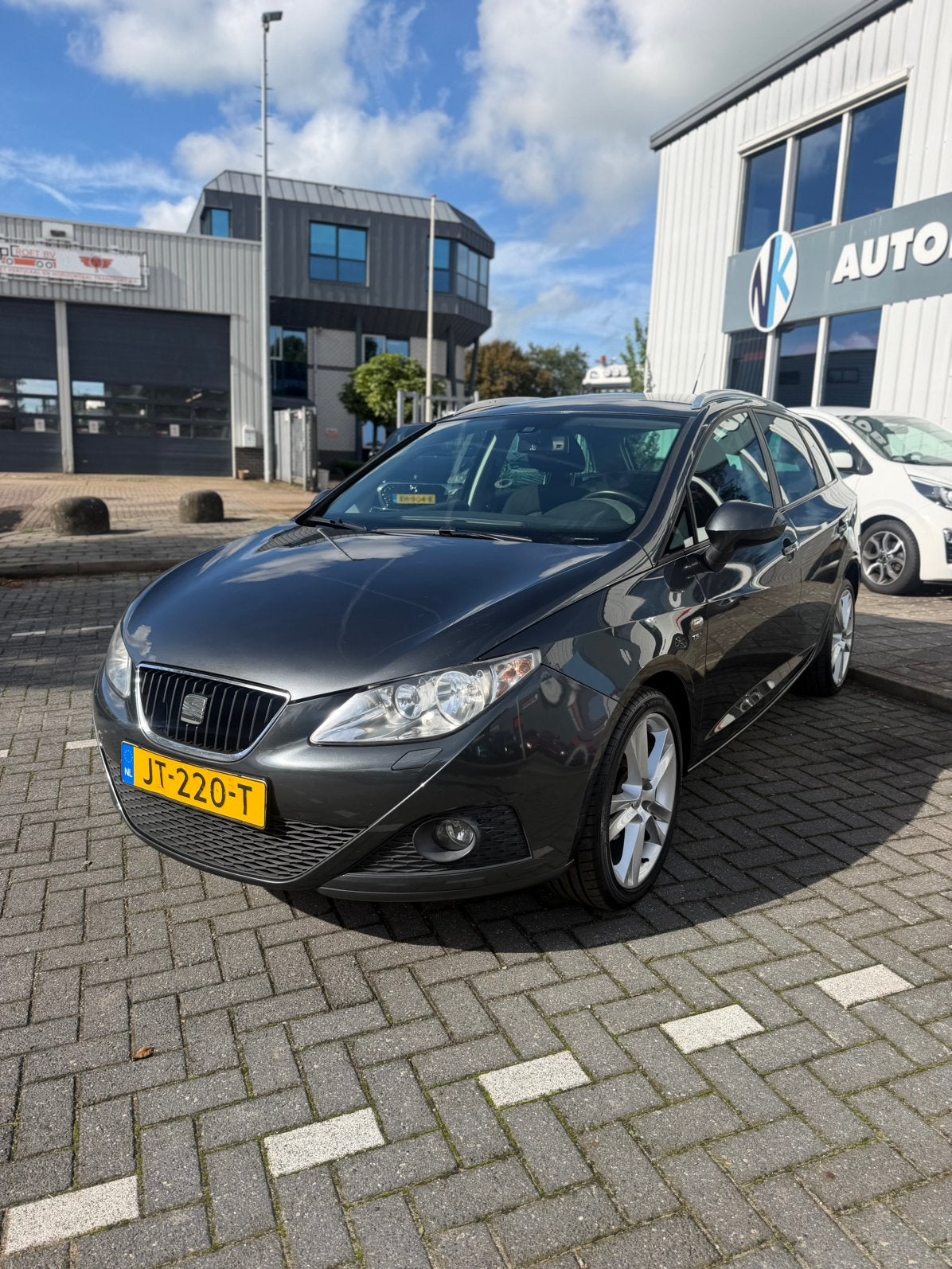 Seat Ibiza 1.2 TSI 77KW ST 2010 Grijs [stoelverwarming!], Auto's, Voorwielaandrijving, Stof, Zwart, 4 cilinders