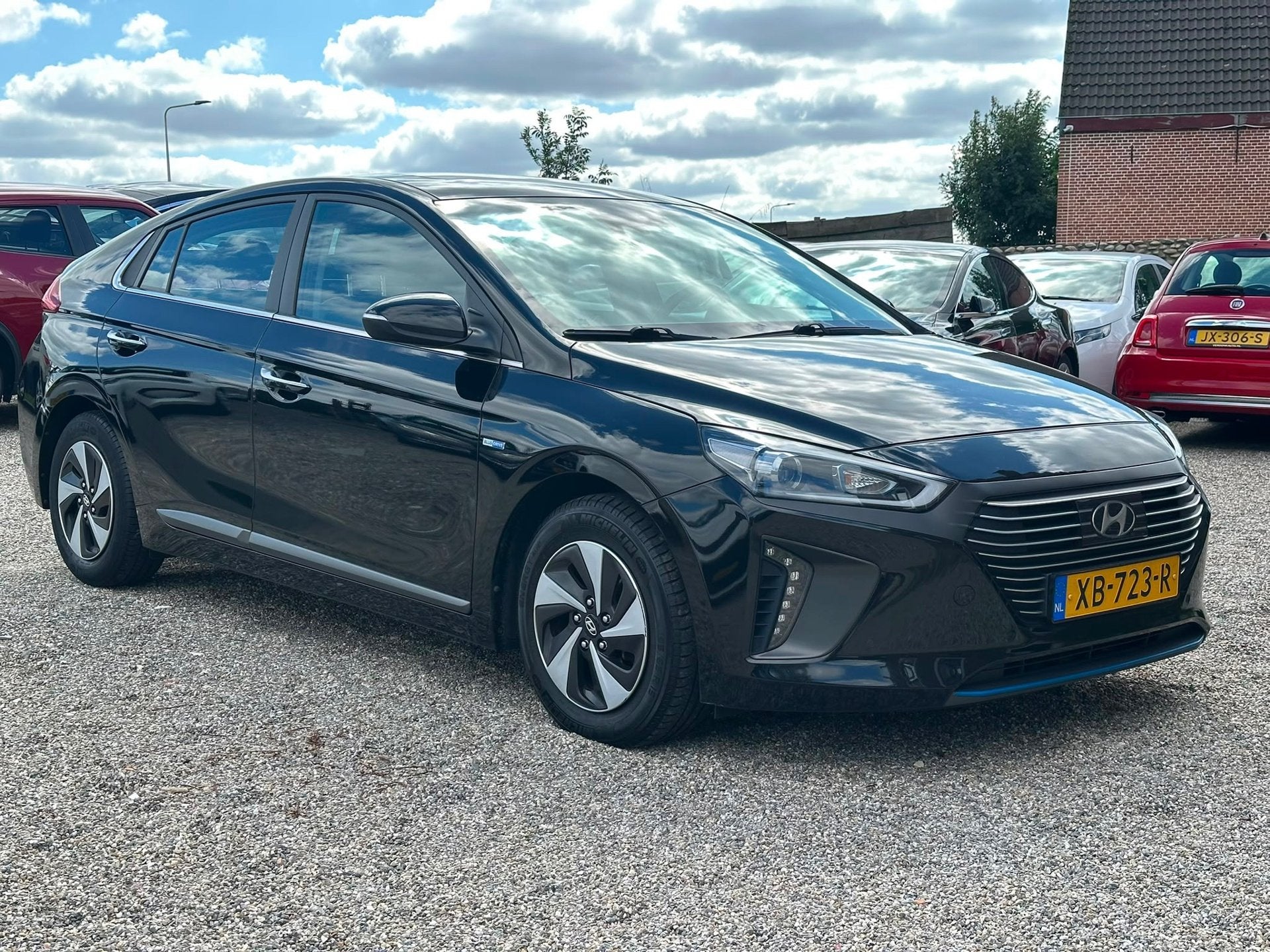 Hyundai IONIQ 1.6 GDi Premium Geleverd met Grote Beurt en Ap, Auto's, Hyundai, Dealer onderhouden, Gebruikt, Zwart, Bedrijf