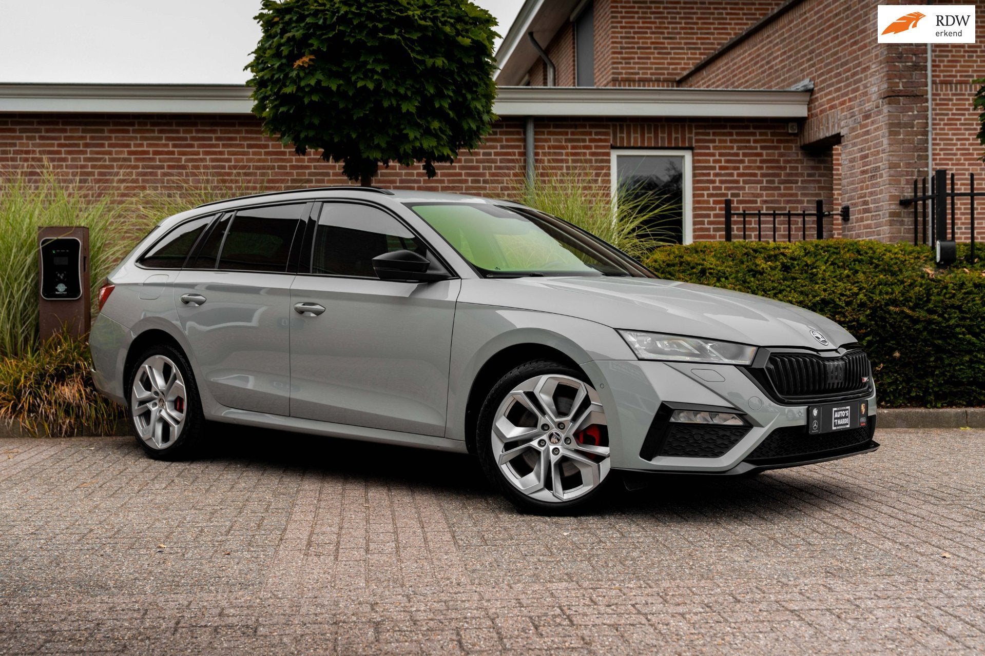 Skoda Octavia Combi 1.4 TSI RS iV PHEV Business 245 PK ACC K, Auto's, Automatische klimaatregeling, Stof, Gebruikt, Zwart