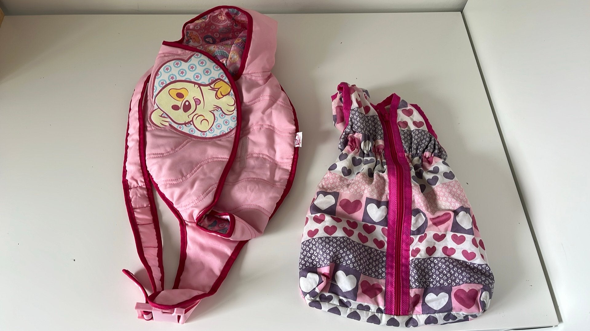 Draagzak en trappelzak babypop annebel, Ophalen, Zo goed als nieuw, Babypop
