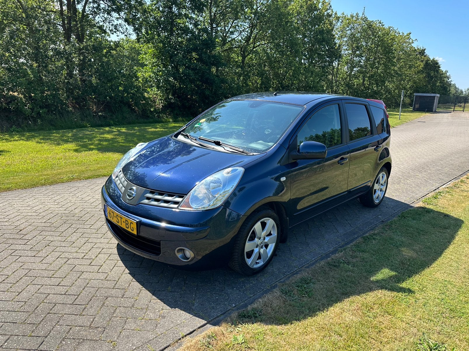 Koopje! Zuinige Nissan Note 1.5 DCI Trekhaak/APK/NAP 2006, Stof, Zwart, 4 cilinders, Blauw