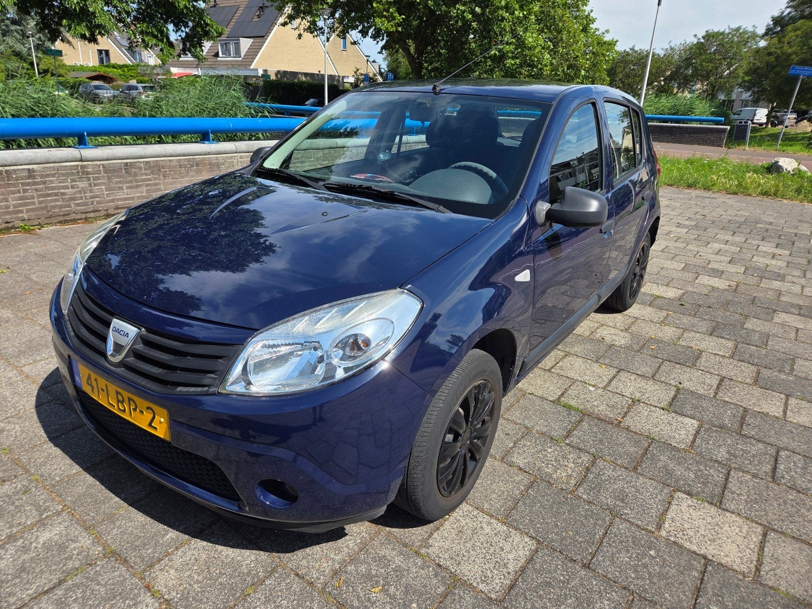 Dacia Sandero 1.2 16V 55KW 2010 Blauw, Auto's, Dacia, Voorwielaandrijving, Stof, 74 pk, 31 €/maand