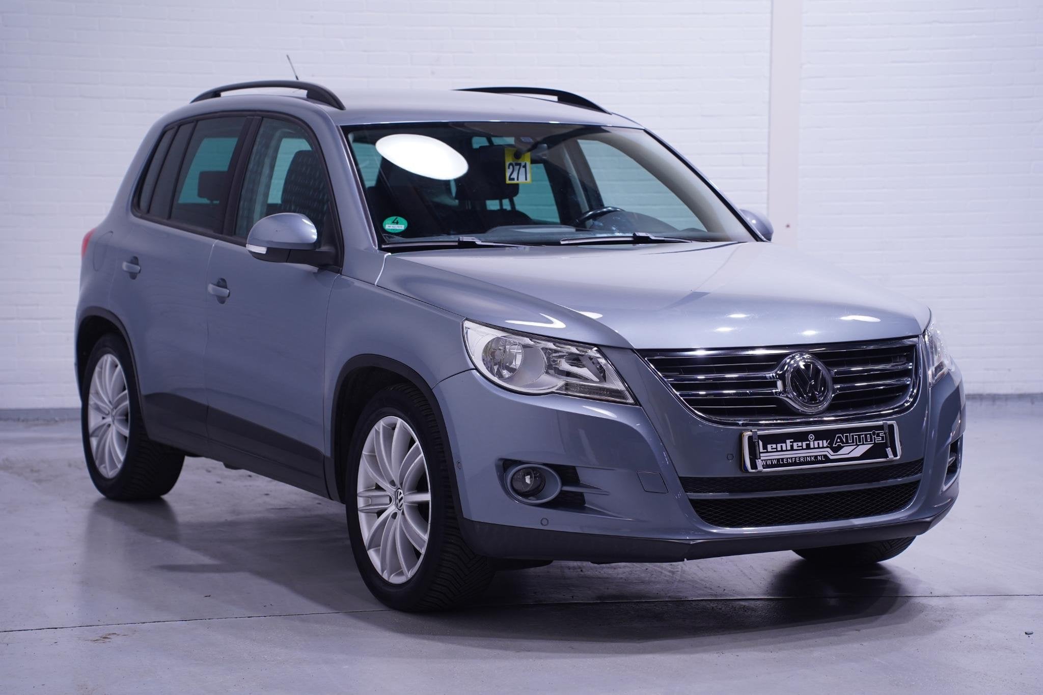 Volkswagen Tiguan 1.4 TSI Trend&Fun 4Motion Clima PDC v+a St, Auto's, Stof, Gebruikt, Zwart, 4 cilinders