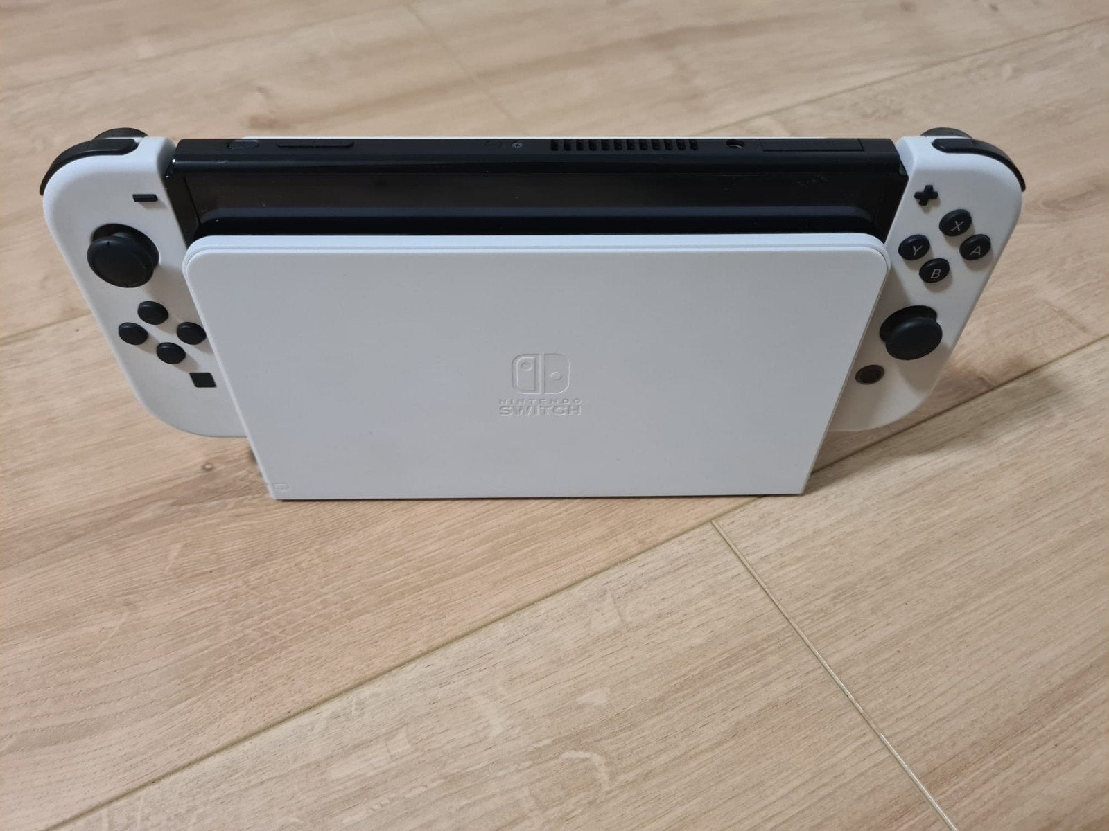 Nintendo Switch Oled met sports, Ophalen of Verzenden, Zo goed als nieuw, Met 1 controller, Switch OLED