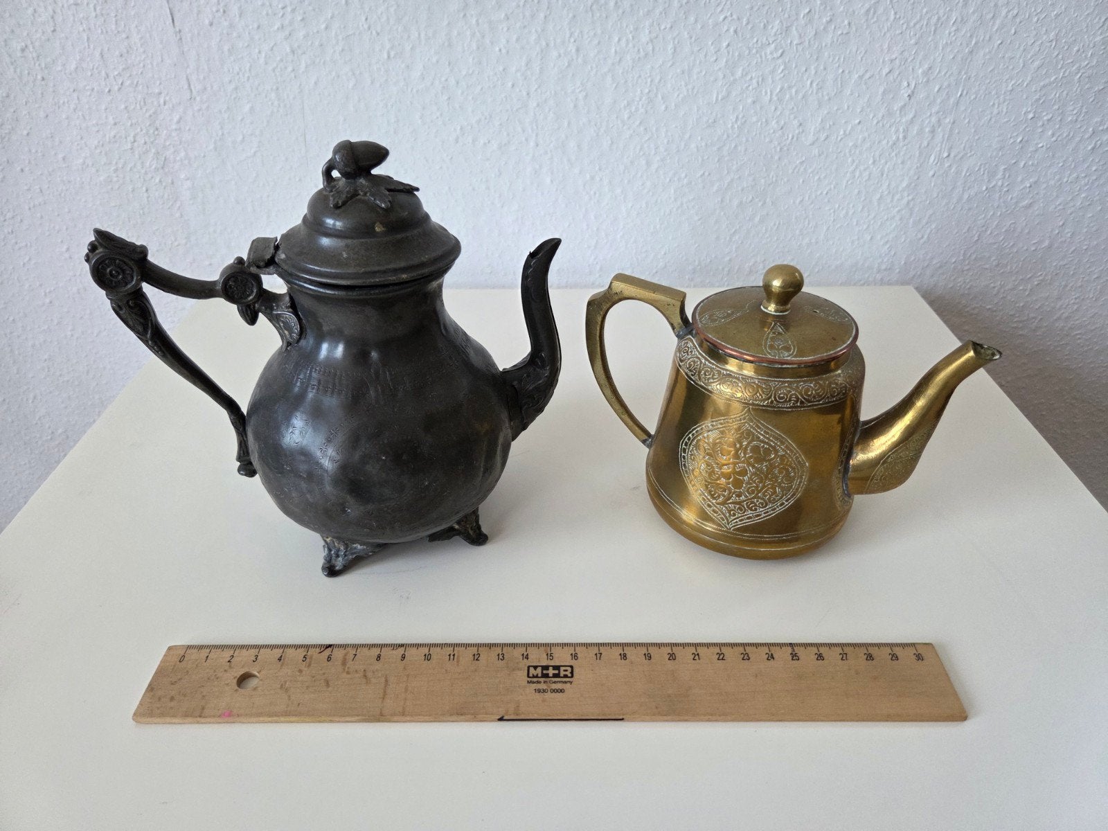 Antieke theepotten: tin en messing set, Ophalen