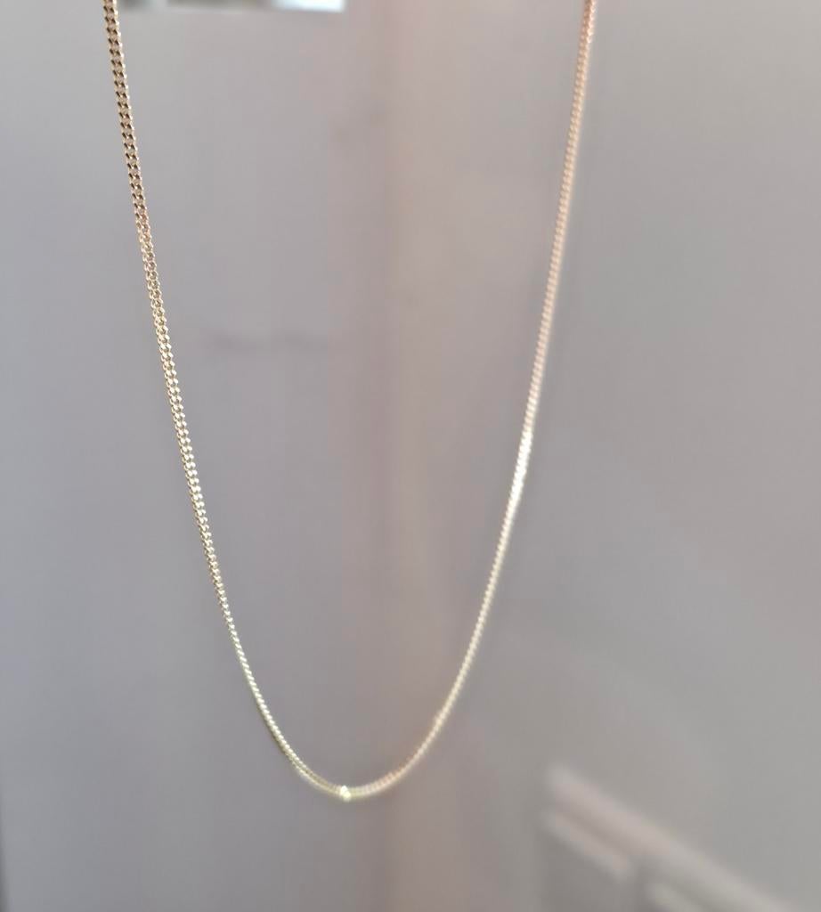 Gouden ketting zeer verfijnd, Ophalen