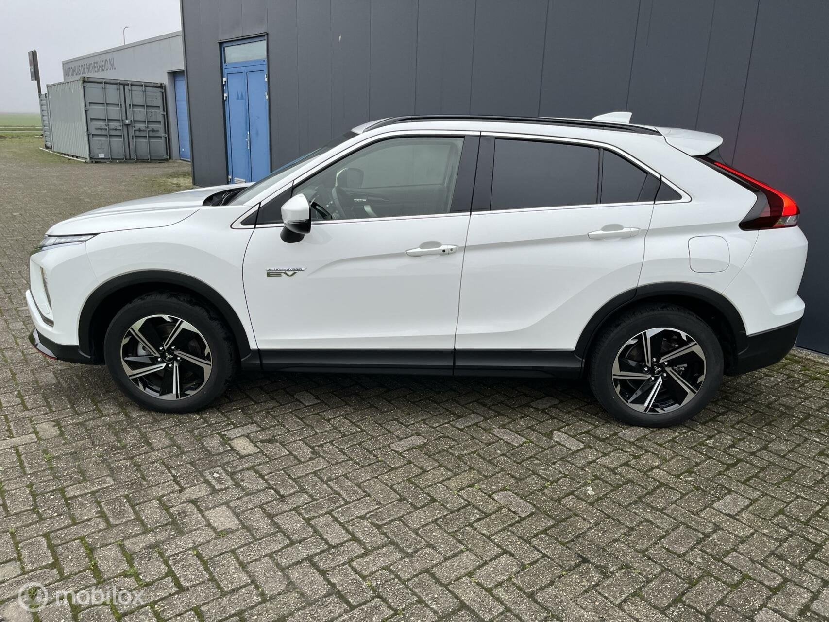 Mitsubishi Eclipse Cross 2.4 PHEV Intense+, Auto's, Automaat, 12 maanden, 4 cilinders, Leder en Stof