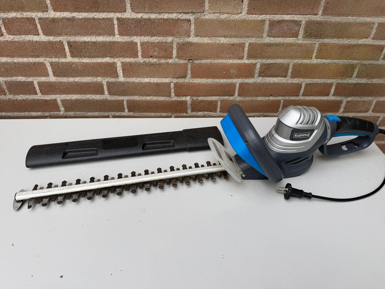 Gamma heggenschaar - Elektrisch, zo goed als nieuw, Tuin en Terras, Ophalen, Zo goed als nieuw, Elektrisch