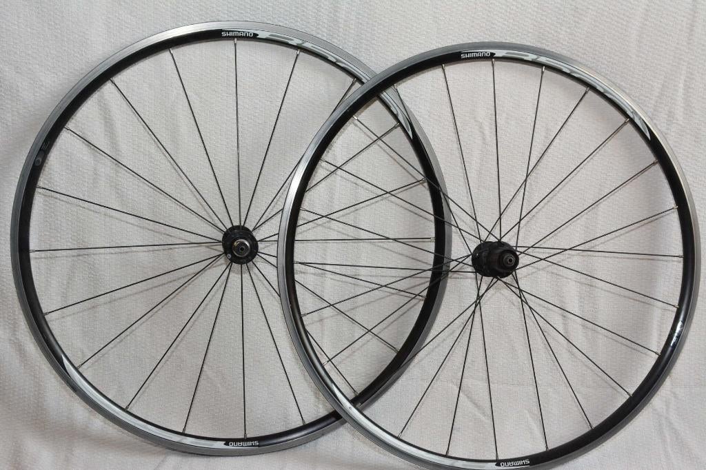 Shimano race WHR500 wielset + Trek Bontrager Hybride wielset, Fietsen en Brommers, Fietsonderdelen, Gebruikt, Stadsfiets, Aluminium