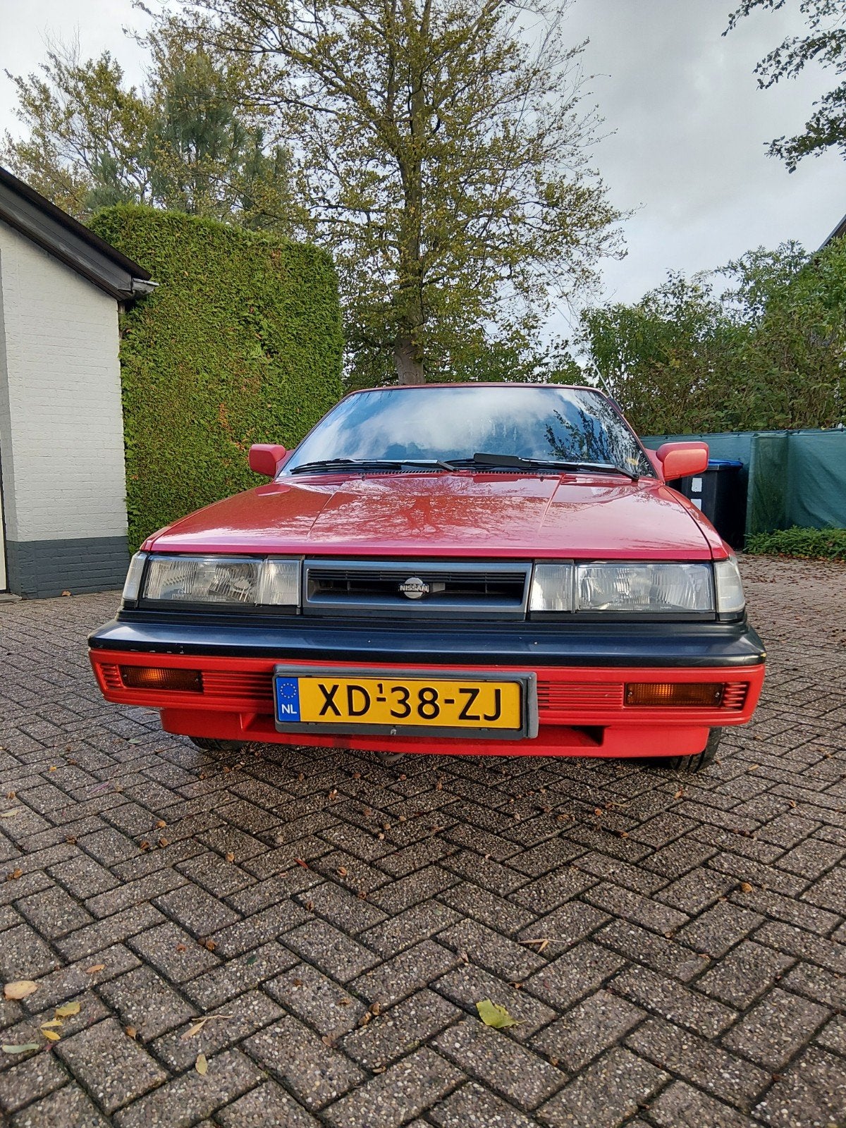 Nissan Sunny 1.6 I Coupe K6 1989 Rood, Auto's, Voorwielaandrijving, Origineel Nederlands, Handgeschakeld, Particulier