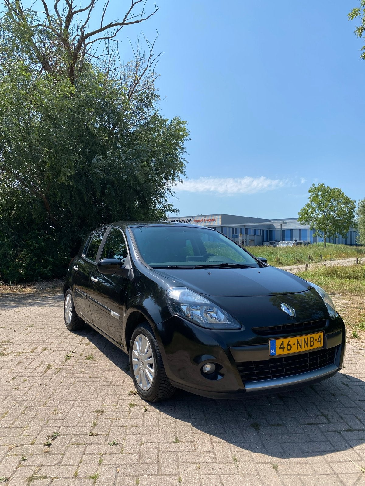 Renault Clio 1.2 16V 55KW 5-DRS 2010 Zwart, Auto's, Voorwielaandrijving, 74 pk, Zwart, Origineel Nederlands
