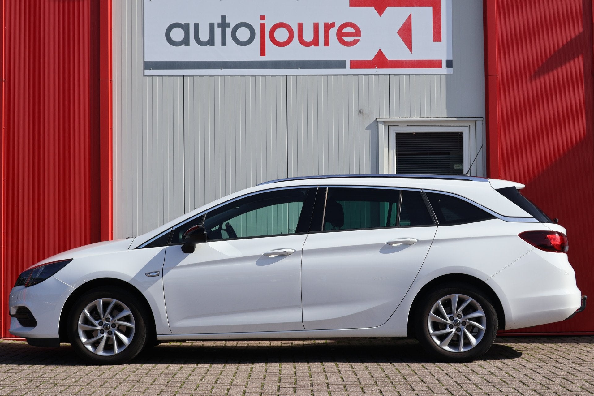 Opel Astra Sports Tourer 1.5 CDTI Business Elegance, Auto's, Voorwielaandrijving, Gebruikt, Wit, Origineel Nederlands