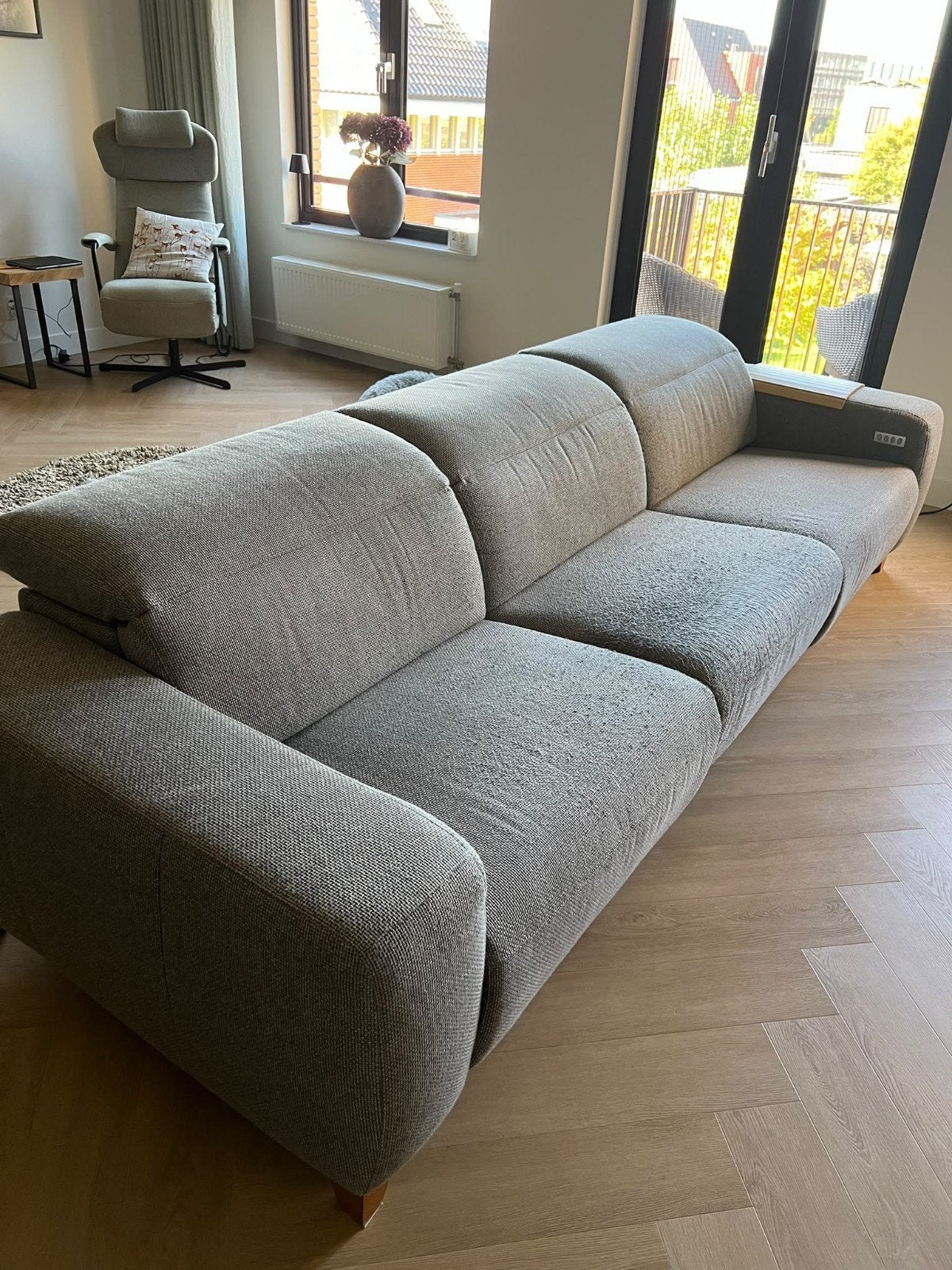 Grijze stoffen bank met relaxfunctie van het merk montel, Ophalen, 250 tot 300 cm, Gebruikt, Modern comfort