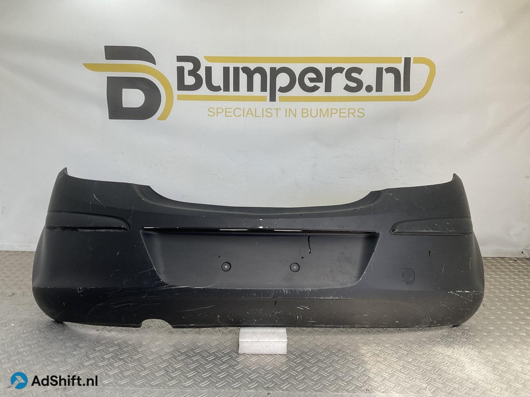 Bumper Opel Corsa D 06-14 13179893 Achterbumper X1-20192, Auto-onderdelen, Carrosserie en Plaatwerk, Bumper