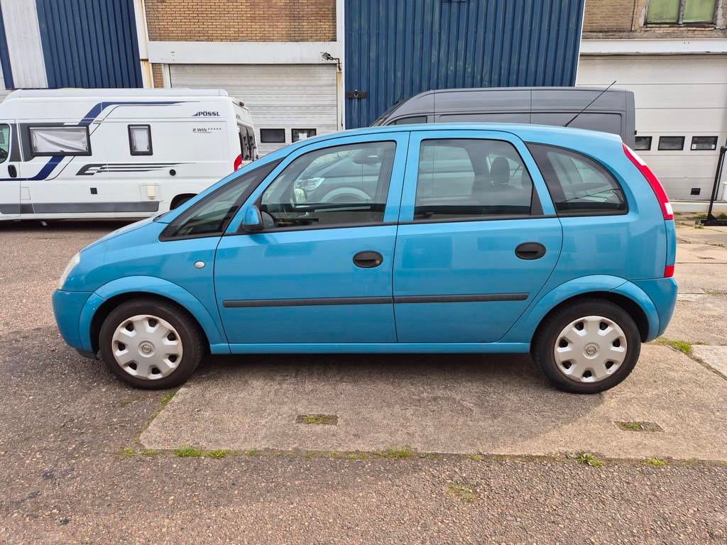 Opel Meriva 1.6-16V Enjoy, apk tot 12-03-2027, Auto's, Gebruikt, Zwart, 4 cilinders, Blauw