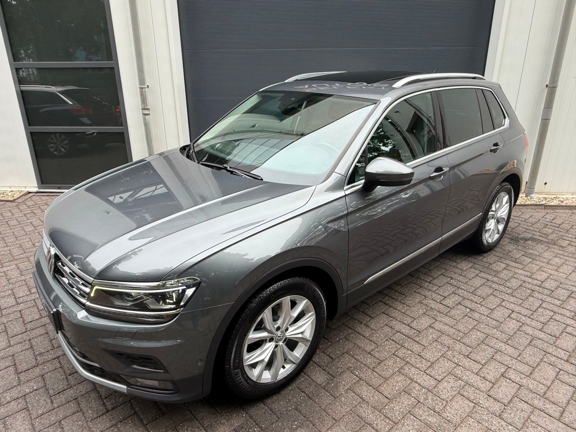 Volkswagen Tiguan 1.5 TSI ACT Highline 150 Pk DSG BTW Pano/V, Dealer onderhouden, 15 km/l, Zwart, 150 pk