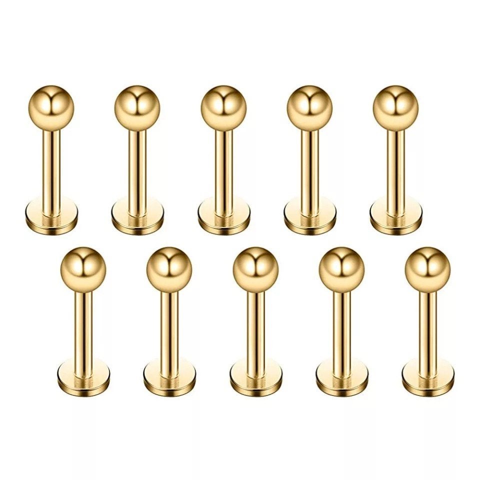 Nieuwe labret piercing. Goud kleur., Ophalen of Verzenden, Zo goed als nieuw, Staal, Oor- of Traguspiercing