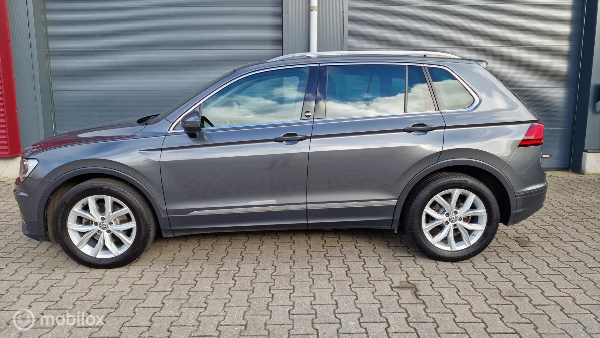 Volkswagen Tiguan 1.4TSI /Panoramadak /Trekhaak / Camera, Stof, 4 cilinders, 150 pk, SUV of Terreinwagen