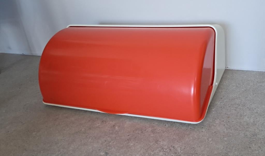 Retro oranje broodtrommel, Ophalen
