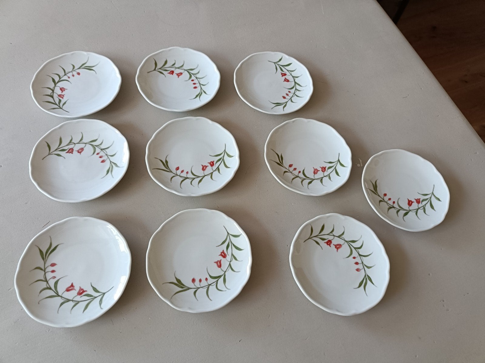 10 kleine bordjes van blad/bloemmotief van hutschenreuter, Antiek en Kunst, Antiek | Servies compleet, Ophalen of Verzenden