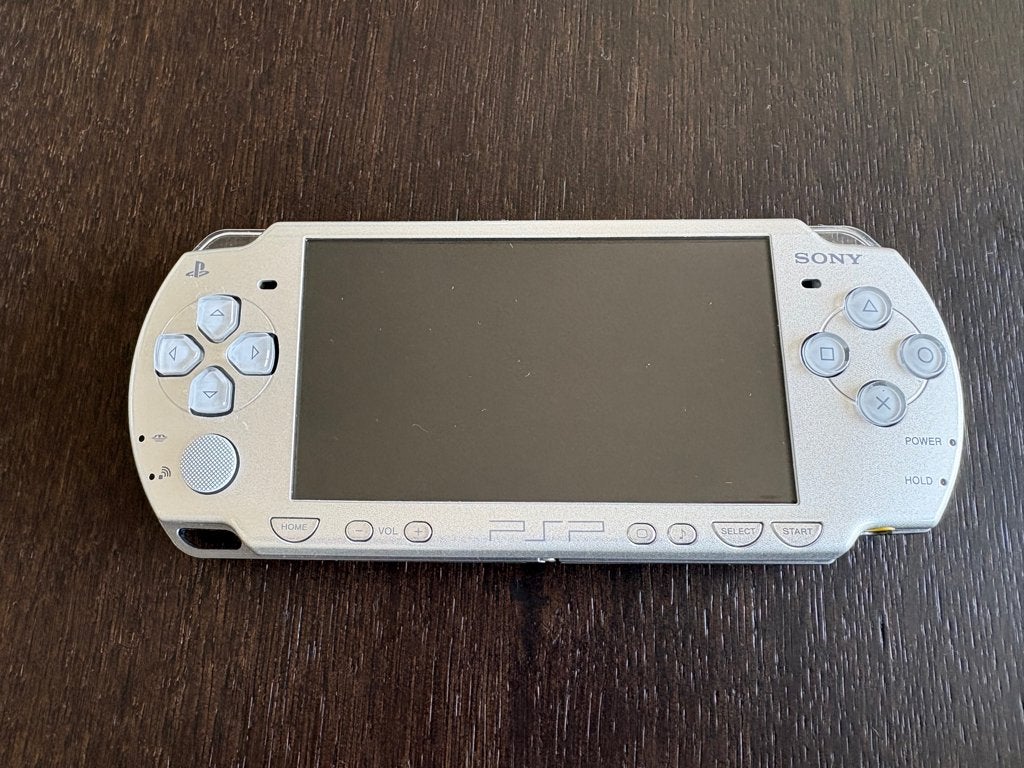 Sony PSP 2004 (Ice Silver), Ophalen of Verzenden, Gebruikt, Overige kleuren, PSP Slim