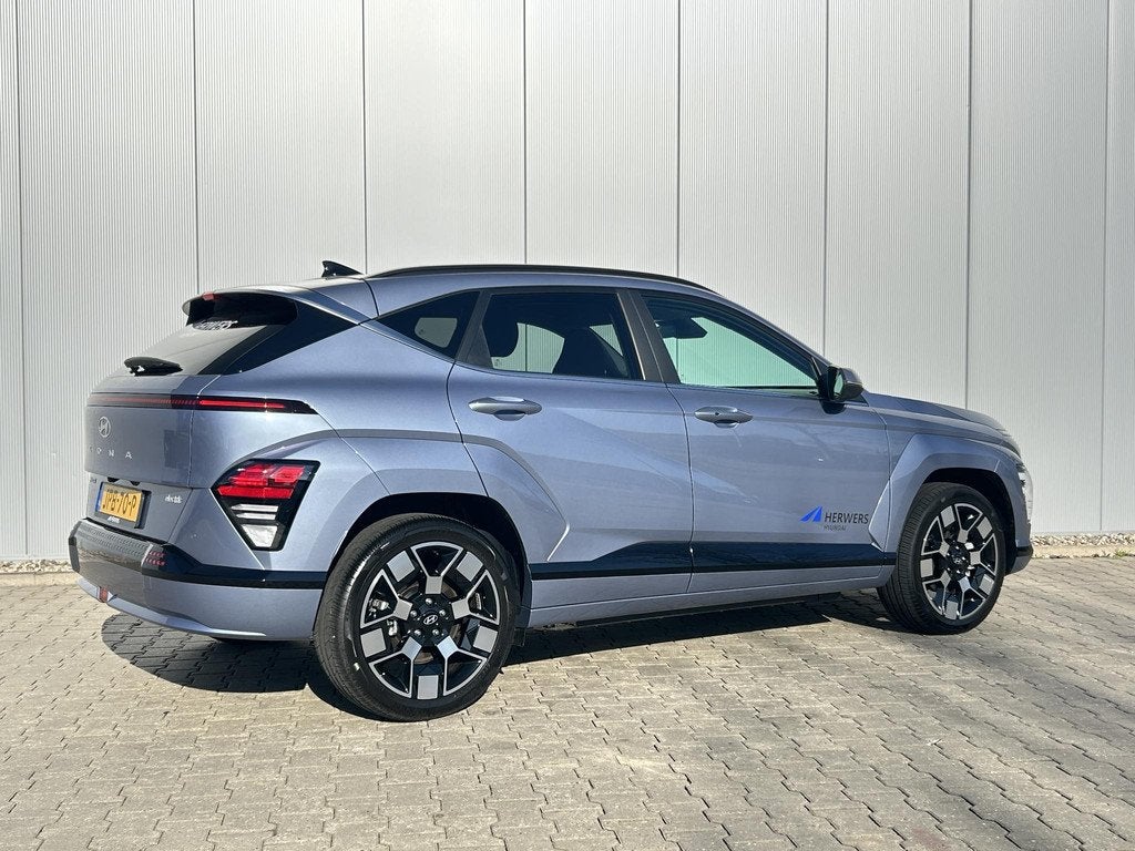 Hyundai KONA Electric Comfort Smart 65.4 kWh / Navigatie / C, Auto's, Hyundai, 750 kg, Blauw, 385 min, 218 pk