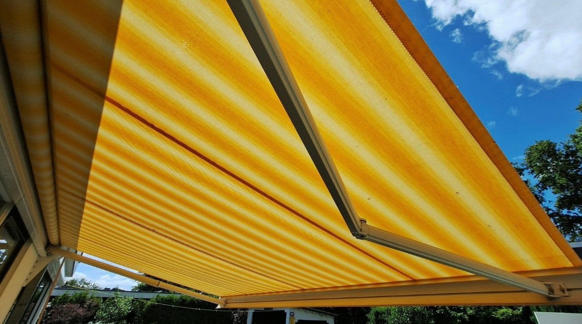 Knikarm zonnescherm geel/wit 5x2,5 m., Tuin en Terras, Ophalen, Gebruikt, 450 cm of meer, 150 tot 300 cm