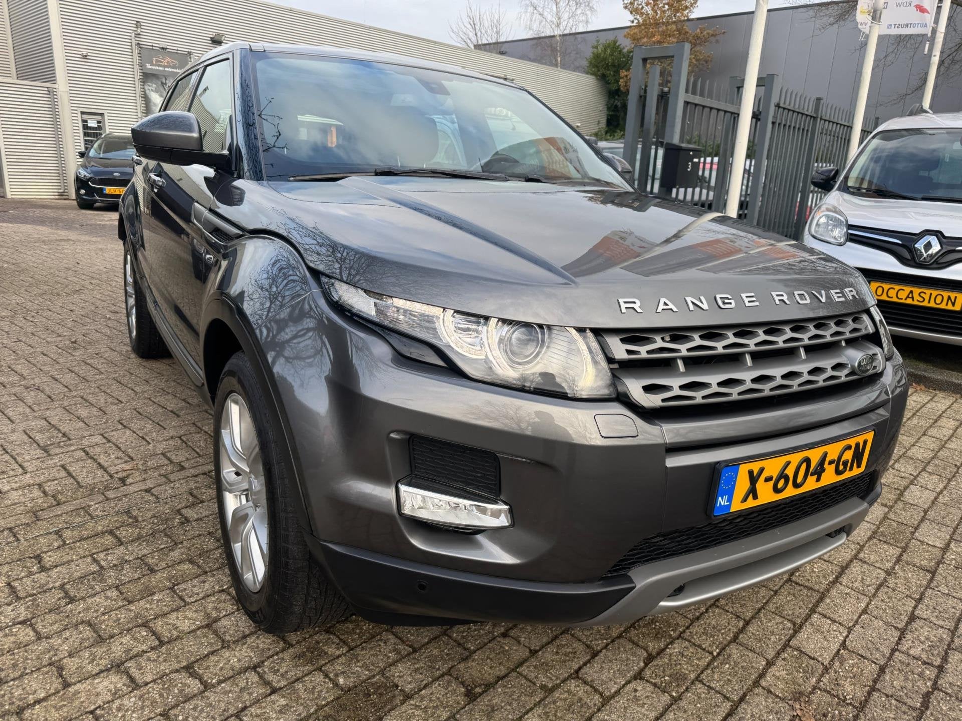Land Rover Range Rover Evoque 2.0 Si 4WD Prestige Business E, Auto's, Automaat, Dealer onderhouden, 4 cilinders, Met garantie (alle)