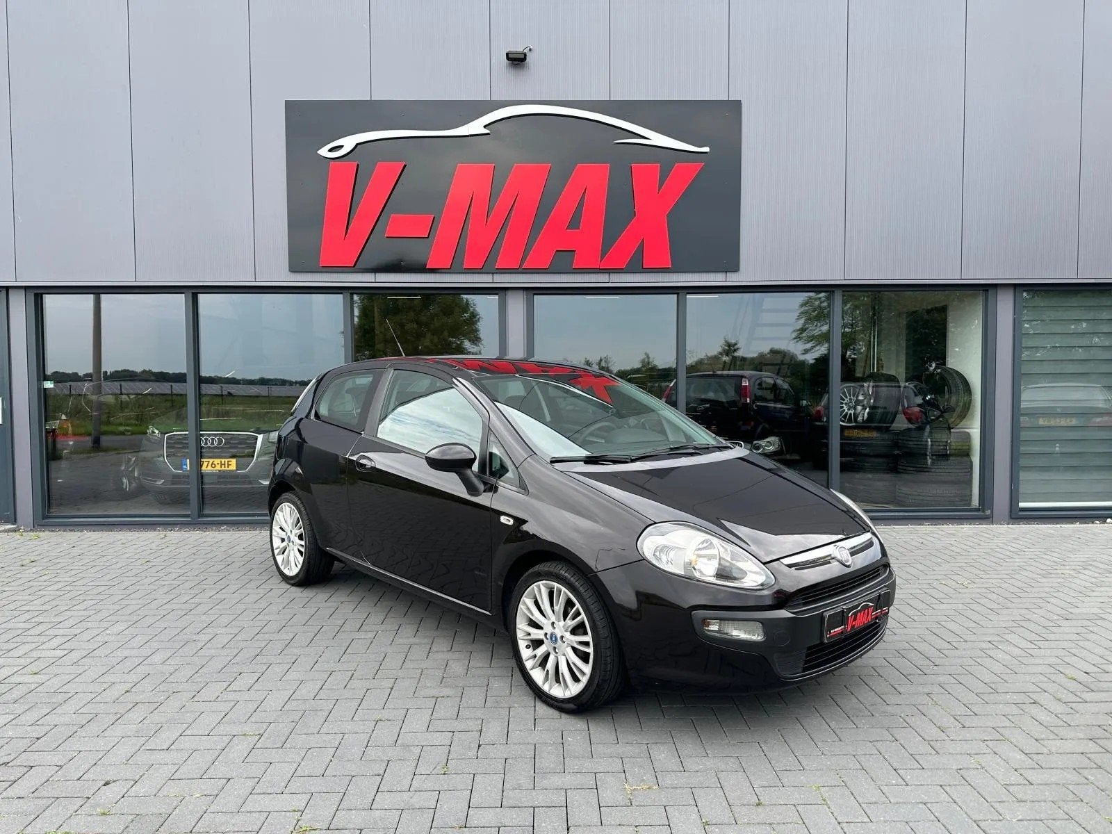 Fiat Punto Evo 1.4 16V 105PK Multiair Dynamic Airco Isofix 1, Auto's, Fiat, Voorwielaandrijving, Euro 5, Stof, Zwart