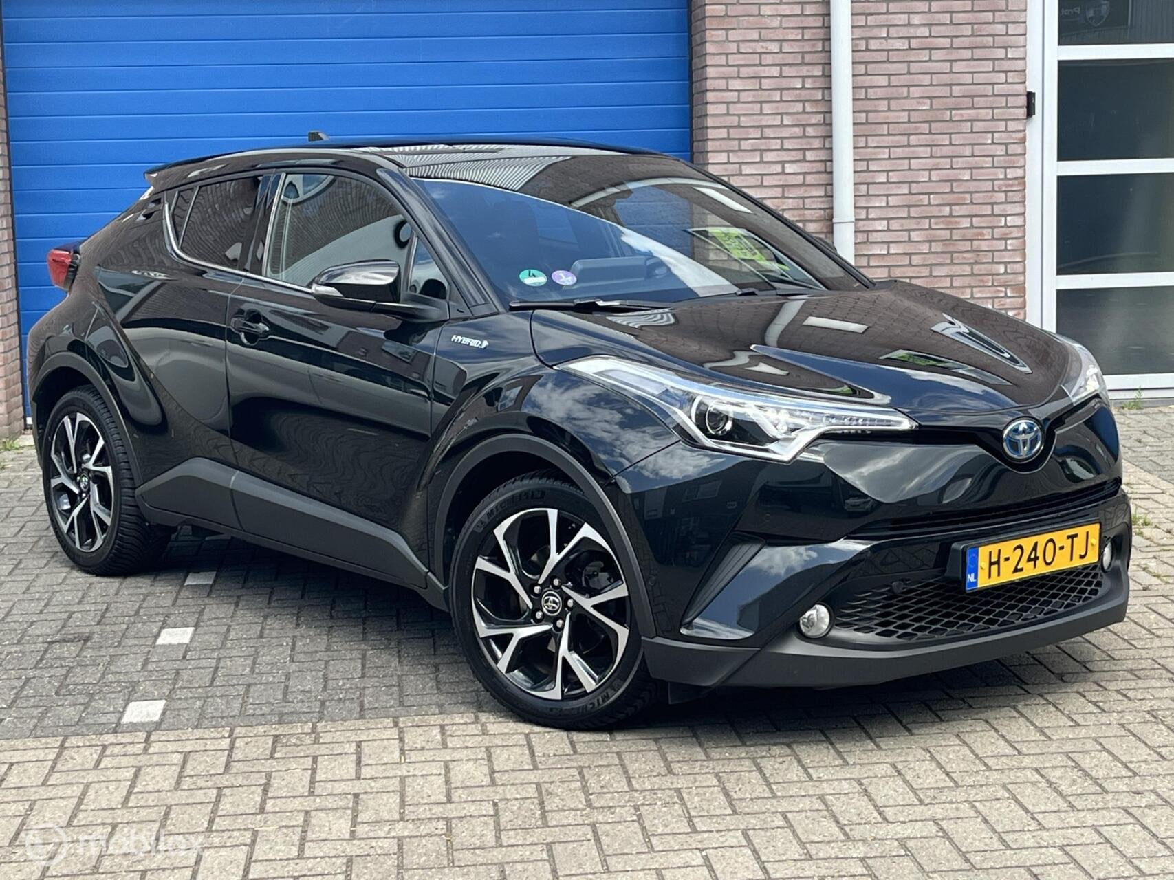 Toyota C-HR 1.8 Hybrid Executive Ultimate Bouwjaar 2019, LED, Auto's, Dealer onderhouden, Euro 6, 4 cilinders, 26 km/l