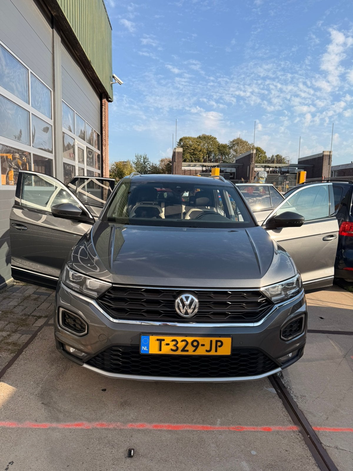 Volkswagen T-Roc 1.5 TSI 150pk 7-DSG 2019 Grijs, Auto's, 1498 cc, Euro 6, 4 cilinders, Leder en Stof