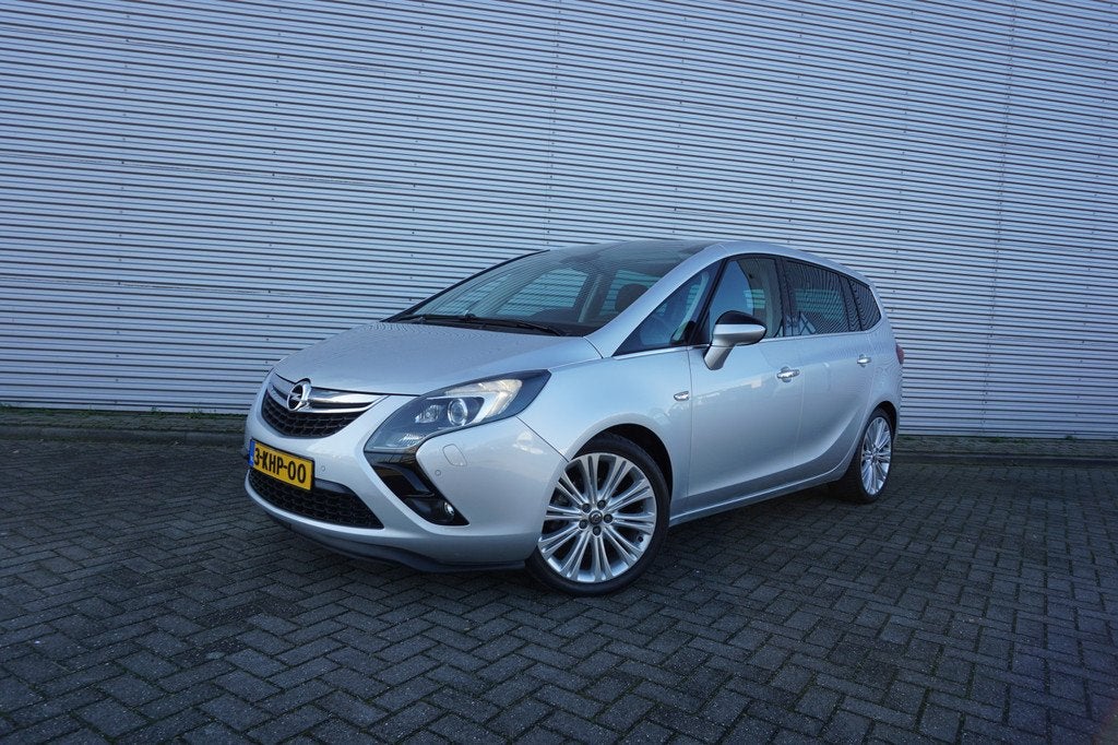 Opel Zafira Tourer 1.4 Cosmo 7persoons - Airco / Navi / Crui, Auto's, Opel, Euro 5, Stof, 4 cilinders, 7 stoelen