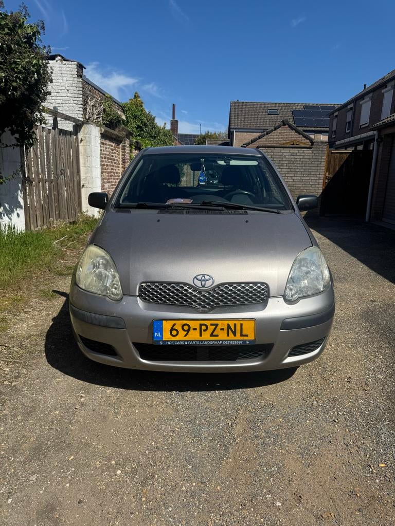 Toyota Yaris 1.0 16V Vvti 5DR 2005 Grijs, Auto's, Stof, 4 cilinders, 400 kg, Origineel Nederlands