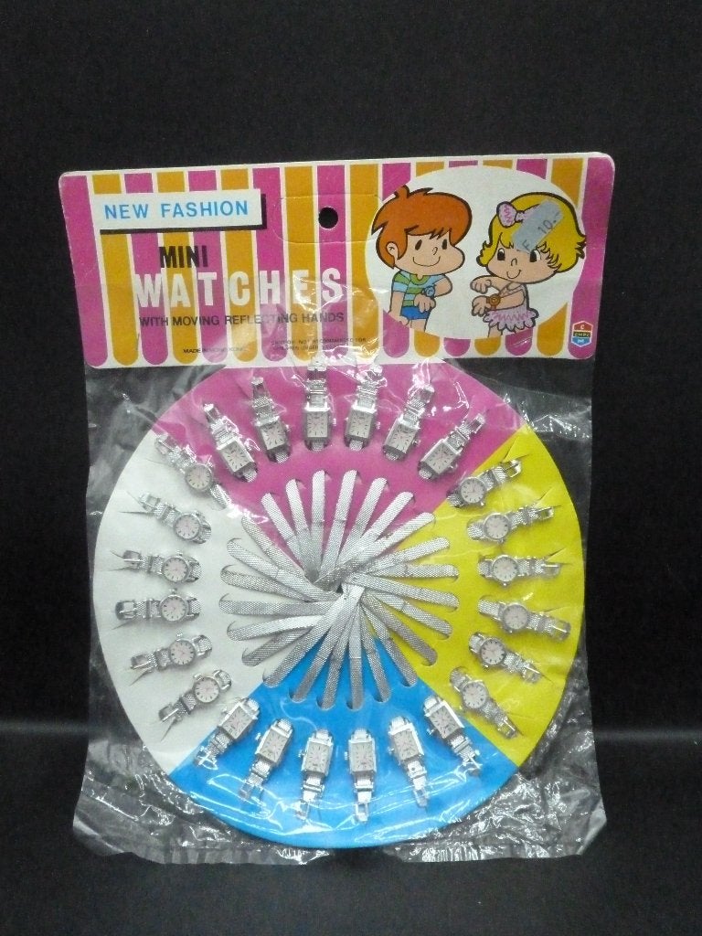 Vintage displaykaart met 24 kinderhorloges speelgoed 1970, Ophalen of Verzenden