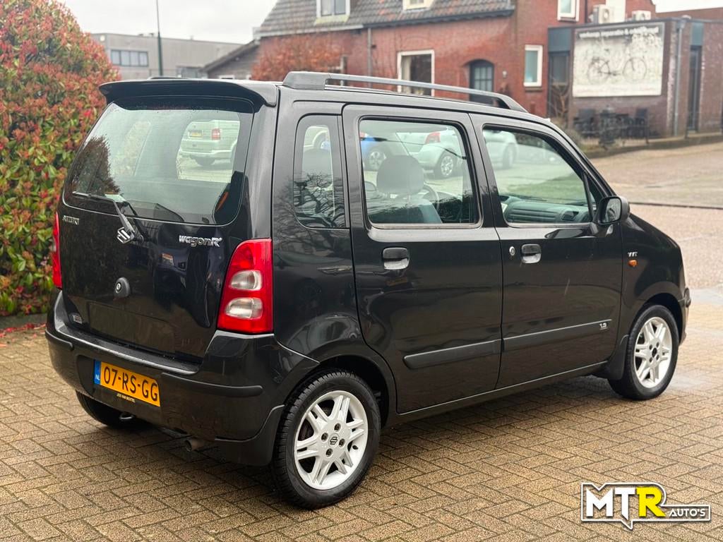 Suzuki Wagon R+ 1.3 FreeStyle 1e EIG|NAP|NWE APK, Auto's, Suzuki, Voorwielaandrijving, 94 pk, Stof, Zwart