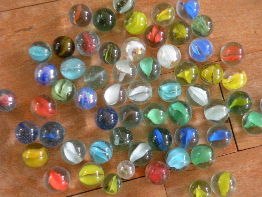 Knikkers, doorzichtig glas met 1 kleurtje erin., Antiek en Kunst, Antiek | Speelgoed, Ophalen of Verzenden